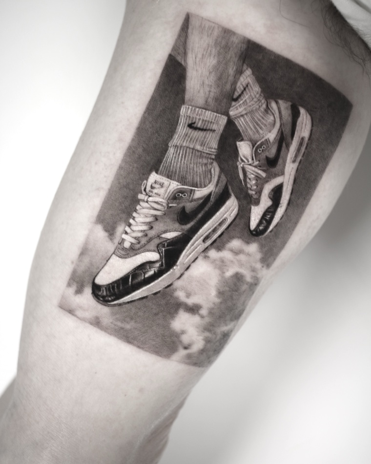 Black and grey realism tattoo by Goldy Z, 2